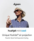 Person holding HushJet Mini Personal Fan With Quiet Evaporative Cooling in hand, showcasing portable design and airflow.