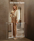 Woman holding dog demonstrating Adjustable Baby Gate For Stairs And Doorways From 29.5 To 41.3 Inches Wide, 30 Inches Tall, White