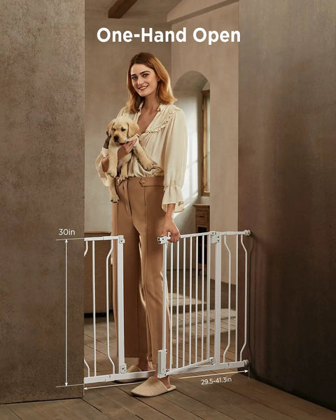 Woman holding dog demonstrating Adjustable Baby Gate For Stairs And Doorways From 29.5 To 41.3 Inches Wide, 30 Inches Tall, White