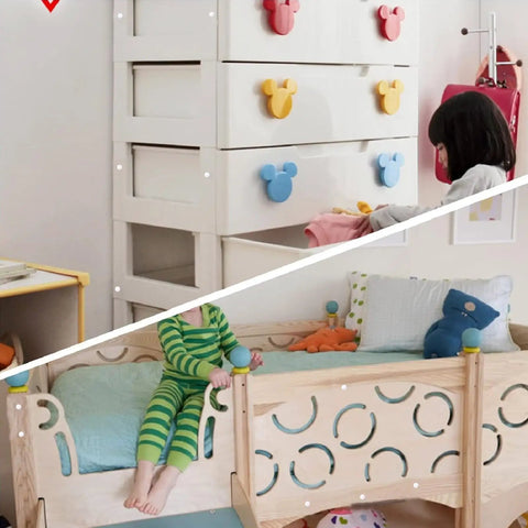 White drawer with colorful Mickey-shaped knobs, child playing on wooden bed with playful design, cozy bedroom setup.