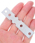 Close-up of a beefed up heavy duty joining plate for wooden door frames, iron metal plate with holes for effortless installation.