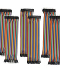 240 Piece Multicolored Dupont Wire Kit Nerd Friendly With 40 Pin Jumper Cables spread out on a white background.
