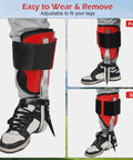 Close-up of Pro Grade Tree Climbing Spikes Kit with Adjustable Steps, showing front and side view on leg, red and black design.