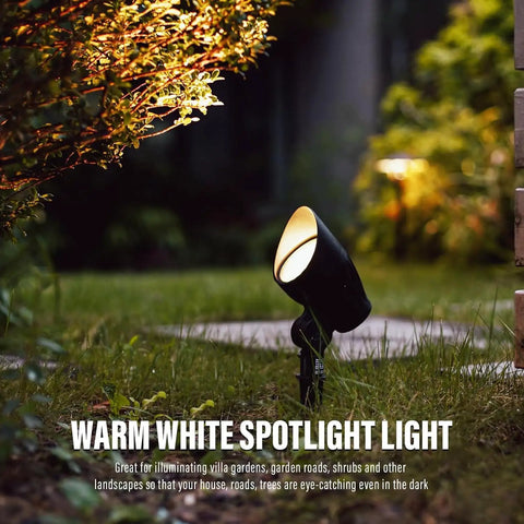 Low Voltage Landscape Spotlights Pro-Grade 50W Halogen Outdoor Garden Lights illuminating garden at night, 12V waterproof metal