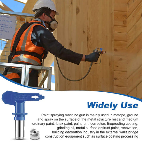 Four Reversible Airless Paint Sprayer Tips Set 215 315 417 523 in use painting a wooden structure, construction setting