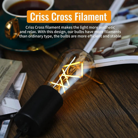 Close-up of Vintage Edison LED Bulbs 60W Equivalent E26 Base 2700K Soft White Dimmable Amber Glass ST64, criss-cross filament lit.