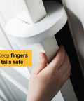 Upgraded Cat Door Latch And Stopper Adjustable White Pet Gate Alternative Dog Proof Door Strap shown on a door with a hand gripping it securely.