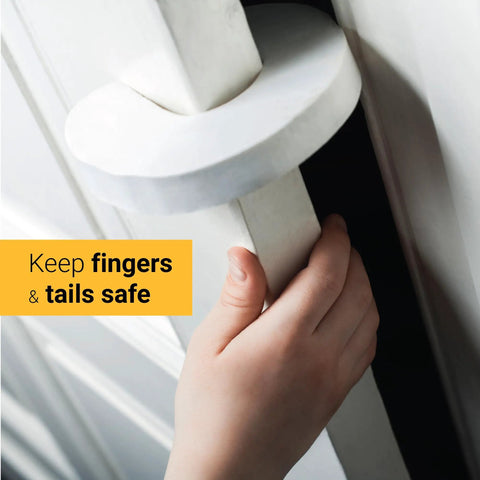 Upgraded Cat Door Latch And Stopper Adjustable White Pet Gate Alternative Dog Proof Door Strap shown on a door with a hand gripping it securely.