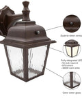 LED Porch Lantern Outdoor Wall Light In Aged Bronze With Clear Water Glass, Dusk to Dawn Sensor, 875 Lumens, 3000K Warm White