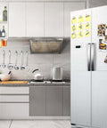 Kitchen scene with a fridge displaying notes secured by Six Pack Super Strong Neodymium Disc Magnets With Double Sided Adhesive.