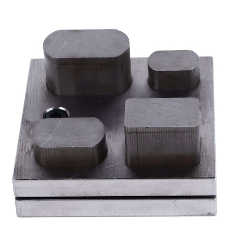 Versatile Alloy Steel Punch Die Disc Set for Jewelry Crafting and Metal Beading, showing four rectangular punch dies on steel block.