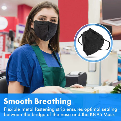 Person wearing KN95 Black Face Masks Pack Of 30 With 5 Layer Filtration Over 95 Percent Efficiency Comfortable Ear Loops in store