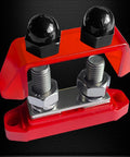 Ridiculously Strong 3/8 Power Distribution Block Bus Bar Offering Dead Serious Two Hundred Fifty Amps And Dual M10 Studs with red cover and nuts.