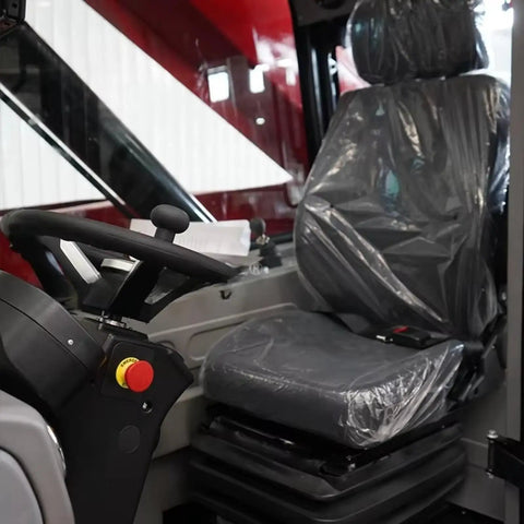 Interior view of Versatile Telescopic Handler With Quick Attach System And Enclosed Brake for warehouses and industrial job sites.