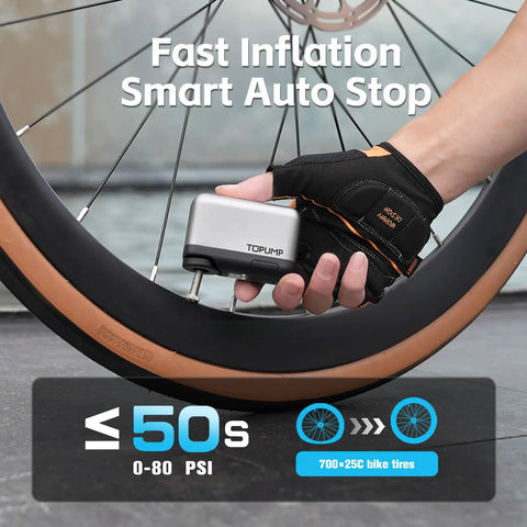 Ultra Portable Mini Bike Tire Pump With Digital Gauge And Auto Stop At 120 PSI Type C Rechargeable Battery next to bike tire