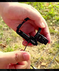 Close-up of Drop Away Arrow Rest For Compound Bow, All Metal Construction With Felt To Preserve Smooth Arrow Flight in hand setup view.