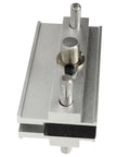 Heavy Duty Self Centering Dowel Jig With Quick Swap Sleeves For 1/4 3/8 And 5/16 Bits showing aluminum housing and adjustable port.