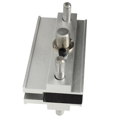 Heavy Duty Self Centering Dowel Jig With Quick Swap Sleeves For 1/4 3/8 And 5/16 Bits showing aluminum housing and adjustable port.