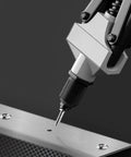 Rivet tool inserting rivet into metal piece, part of 600 Piece Aluminum Pop Rivet Set Kit With Fifteen Size Assortment For Auto, Metalworking, And Furniture Projects Including Three Thirty Second Inch, One Eighth Inch, Five Thirty Second Inch, Three Sixteenth Inch, And One Quarter Inch Rivets
