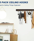Stainless Steel Screw Mounted Ceiling Hooks Built Tough Heavy Duty Coat Hangers For Bathroom Kitchen Garage Cabinet 10 Pack Brushed Gold Under Shelf Towel Robe Clothes Hooks Rustproof Easy Install shown installed with hanging items.