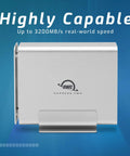 Tough Aluminum Four Slot Nvme M.2 Ssd Enclosure With Blazing Usb4 Kick Thunderbolt Sync and Optimized SoftRAID Config showing sleek design.