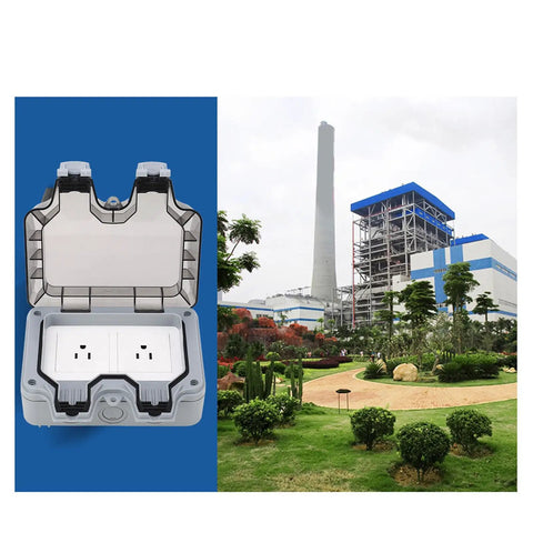 Tough As Nails IP66 Weatherproof Outdoor Electrical Outlet Box Featuring Dual 15A Power Sockets And Rainproof Seal, open view in a garden setting.