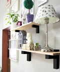Tough As Nails Heavy Duty Floating Shelf Brackets Set Of Four Adjusts Securely To Glass And Wood Supports 25 Pounds Per Pair Premium Zinc Alloy With Polished Chrome Finish For Bathroom Remodels on wooden shelves.