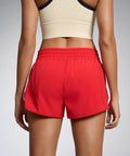 Back view Womens Quick Dry Running Shorts 2.5 Inch Inseam With High Waisted Zip Pockets Lightweight Gym Shorts Built In Liner Red XS
