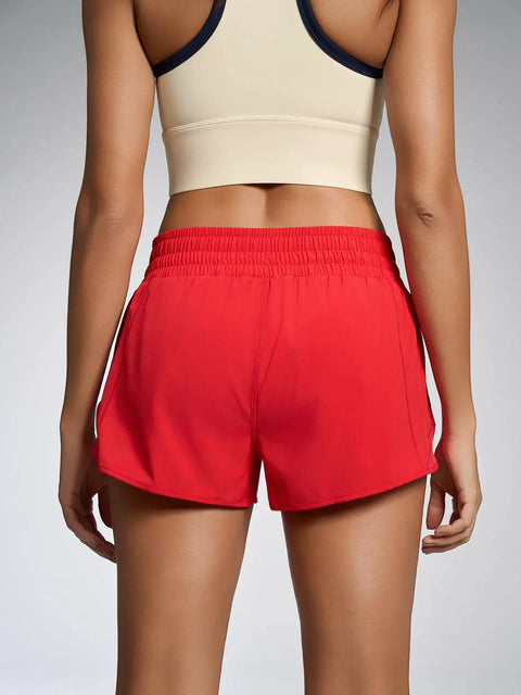 Back view Womens Quick Dry Running Shorts 2.5 Inch Inseam With High Waisted Zip Pockets Lightweight Gym Shorts Built In Liner Red XS