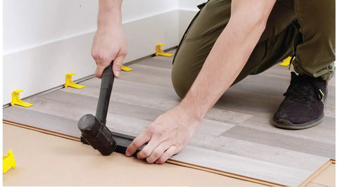 Laminate Flooring Spacers For Easy DIY Floor Installations, T Shape Design Never Falls, Slips, Or Tips in use during installation