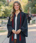 Graduate wearing black gown and a Red 68 Inch Graduation Honor Cord With Tassels At Both Ends, Durable Polyester Yarn, Knotted Ends.
