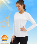 Woman wearing women's long sleeve rash guard shirt with UV 50 plus protection for hiking running and fishing lightweight quick dry breathable fabric moisture wicking sun shield top for all day comfort in the sun.