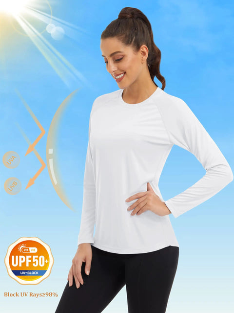 Woman wearing women's long sleeve rash guard shirt with UV 50 plus protection for hiking running and fishing lightweight quick dry breathable fabric moisture wicking sun shield top for all day comfort in the sun.