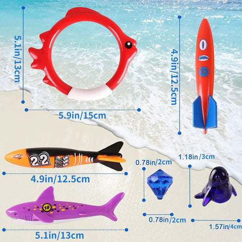Diving Pool Play Set With Fourteen Pieces For Underwater Games And Party Favors on a beach background, various toy sizes shown.