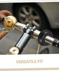 Bicycle handlebar with bell, grips, and accessories attached.
