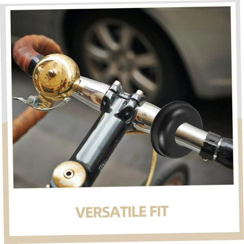 Bicycle handlebar with bell, grips, and accessories attached.