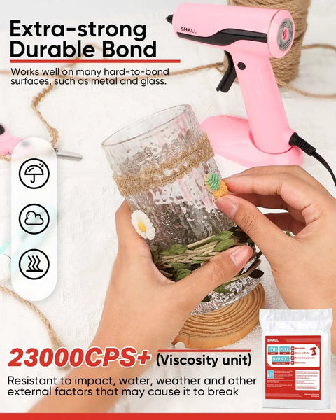 Person using full size clear hot glue stick with pink glue gun for glass decoration, part of 70 pack for all temp glue guns.