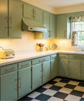Kitchen featuring Antique Brass Cabinet Pulls Set For Retro Vibe 10 Pack 6.3 Inch Long installed on green cabinets.