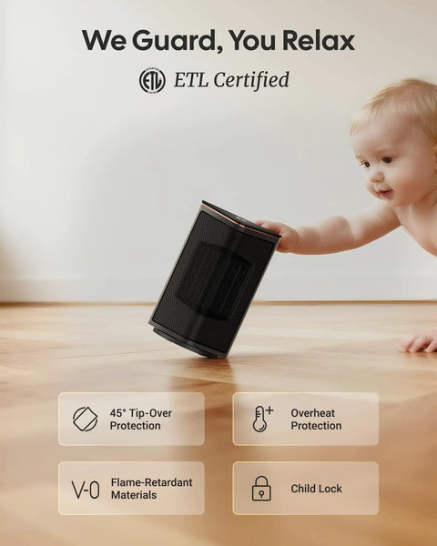 ETL certified black ceramic space heater with tip-over protection being touched by a baby, highlighting safety features.