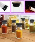 Must-Have Silicone Hole Plug Set With Fifty One Pieces In Six Sizes Eight Point Three Mm, Ten Mm, Fifteen Mm, Nineteen Mm, Twenty One Mm And Twenty Six Mm T Shaped Rubber Stoppers For Waterproof Snap On Bottle Seal Black shown sealing spice jars, dust prevention, waterproofing, and heat resistance.