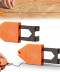 Two orange Rope Anchor Hooks for One Handed Quick Fixes in Carpentry, shown with rope anchored on wood surface for easy use.
