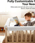 Child reading in a bed with Toddler Bed Rail Bumpers Set For Safe Sleep With Soft Kid Safe Padding Guardrail Cushions installed.