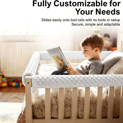 Child reading in a bed with Toddler Bed Rail Bumpers Set For Safe Sleep With Soft Kid Safe Padding Guardrail Cushions installed.