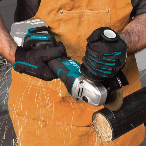 Worker using 18V LXT Brushless Cordless Paddle Switch Cutoff And Angle Grinder Four And One Half Inch To Five Inch Electric Brake