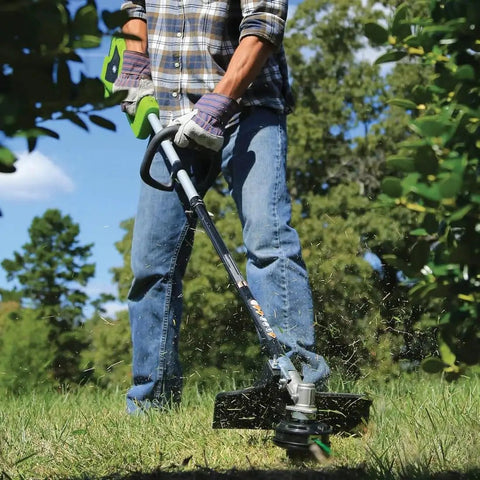 Person using cordless trimmer with 0.080 Inch String Trimmer Line, 157 Ft Pre Cut Twisted, Heavy Duty Replacement For Greenworks
