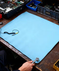 Blue anti-static ESD mat for electronics repair with grounding wire and alligator clip; 26.4 x 20.1 in