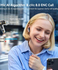 Woman using Air Pro 4 Wireless Earbuds With Adaptive Hybrid Noise Canceling For Crisp Sound And Big Battery Life in city setting.