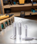 Four Heavy Duty M8 Spring Plunger With Smooth Pull Ring Self Locking Retractable Bolt Threaded Pin Stainless Steel on workspace.