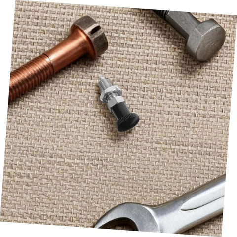 Heavy Duty Tough As Nails Stainless Steel Indexing Plunger With Spring Loaded Knob on a work surface with tools for industrial use.