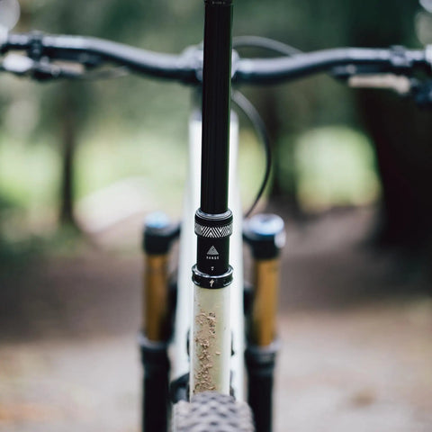 Internal Routing MTB Dropper Post With Adjustable Travel, 30.9mm Diameter, 175mm Length, shown on a mountain bike.